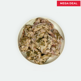 Plated raw chicken wings with marinated lemon, garlic & oregano seasoning on a white background, labeled 'Mega Deal'.