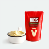 Red Vics package with a bowl of creamy potato mash on a white background