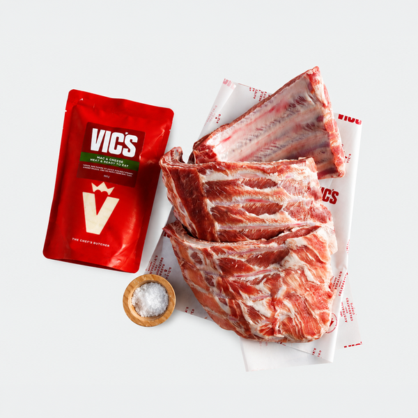Raw meat with VICS packaging on a white background