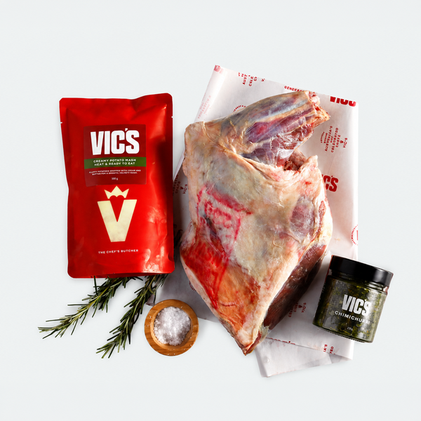 VICS branded product package with raw meat, rosemary, salt, and a container on a white background