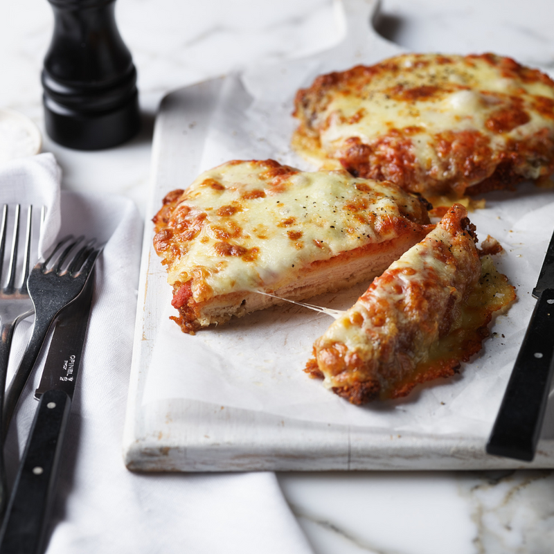 The Parmi Kit with crumbed chicken schnitzels, tomato passata and melting mozzarella cheese