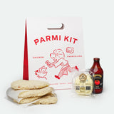 The Parmi Kit with crumbed chicken schnitzels, tomato passata and melting mozzarella cheese