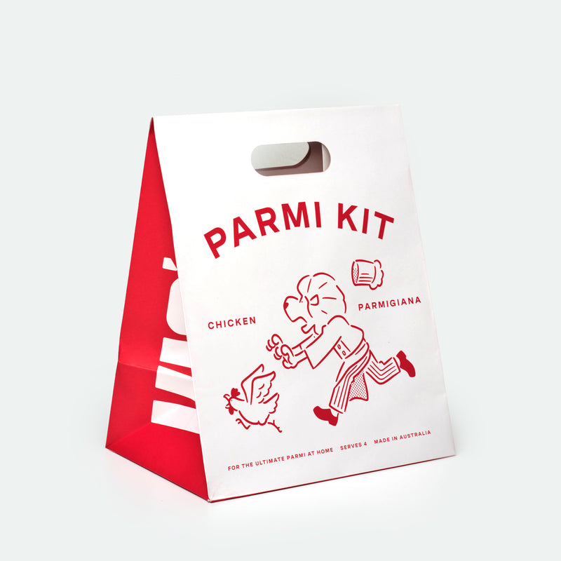 The Parmi Kit with crumbed chicken schnitzels, tomato passata and melting mozzarella cheese