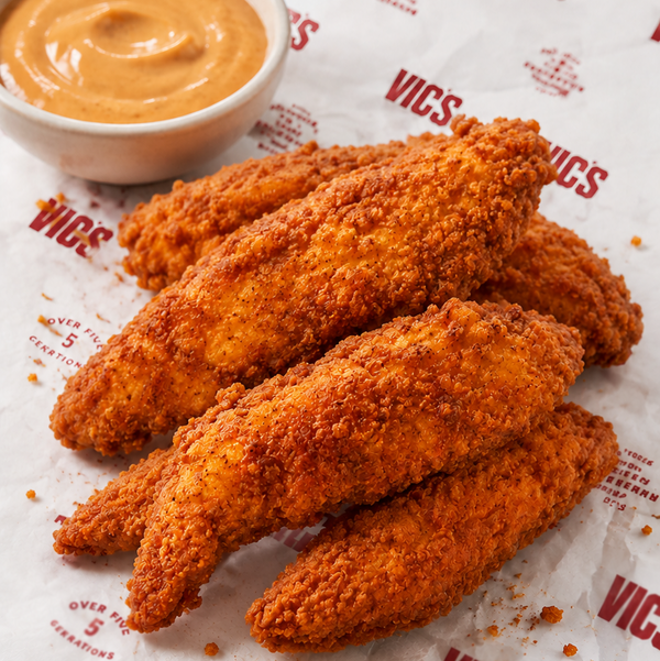 Southern fried chicken tenders paired with sauce