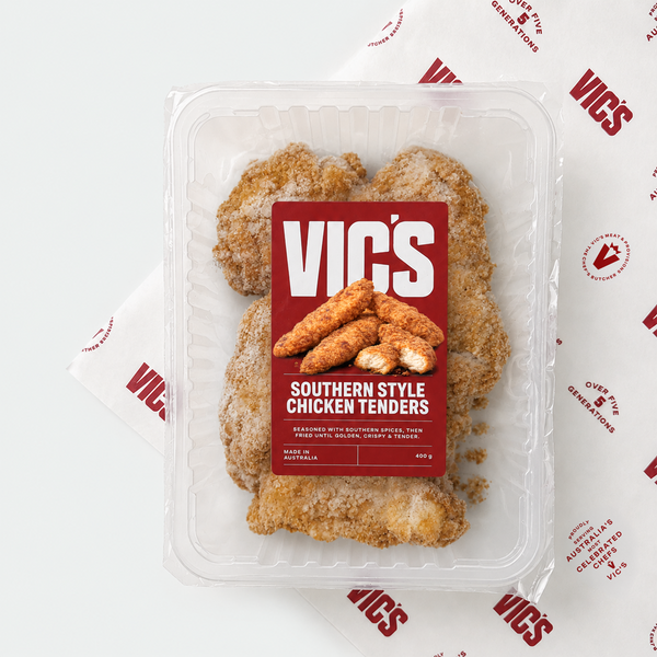 Pack of Vic's Southern Style Chicken Tenders in a clear tray with branded red label on Vic's butcher paper.