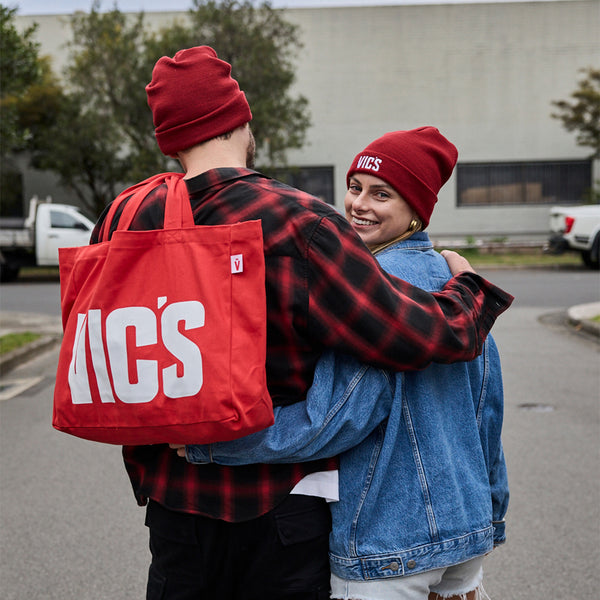 VIC’S branded red tote with logo detail
